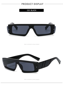 Detail view of black square sunglasses with ribbed temple design and tinted lenses