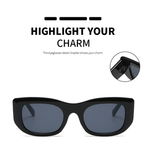 Detail of reinforced metal hinge on vintage rectangle sunglasses with thick black frame