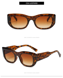 Detail view of leopard print rectangular sunglasses with brown gradient lenses