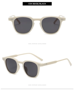 Détails de lunettes de soleil rondes rétro beige avec rivets et verres foncés