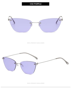 Detail view of purple rimless cat eye sunglasses with sleek silver metal frame