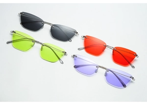 Four pairs of rimless cat-eye sunglasses in black, green, orange and purple colors