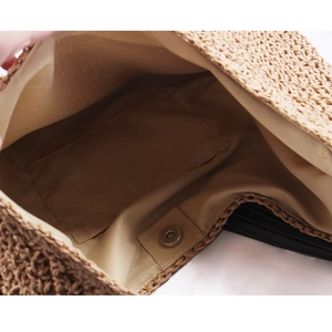 Large straw shoulder tote bag with brown woven texture and magnetic metal closure