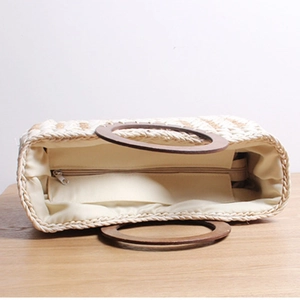 Retro striped straw tote with round wooden handles and secure zip closure for beach vacation