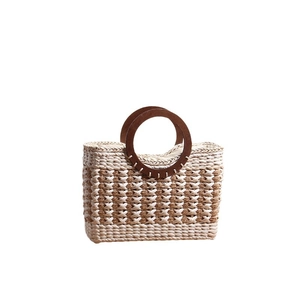 Vintage striped woven straw beach bag with large capacity and dark brown wooden handles
