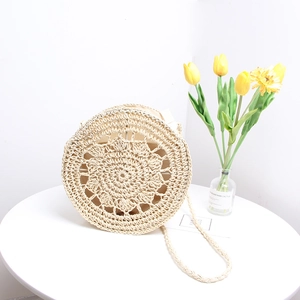Handmade cream white round straw shoulder bag with hollow out crochet for beach vacation