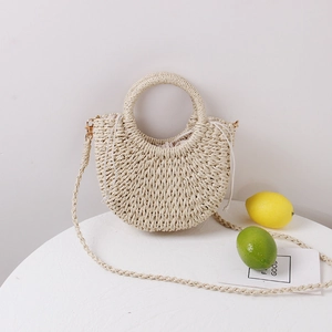 Handmade woven straw beach handbag with circular handles and drawstring lining