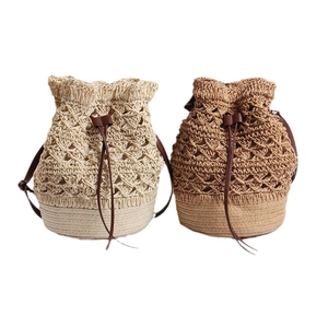 Handmade hollow straw bucket bags in cream and khaki with leather drawstring and shoulder straps