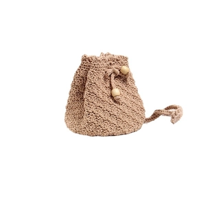 Handmade crochet drawstring bucket bag in khaki knit with decorative wooden beads