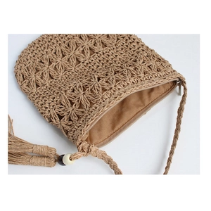 Straw shoulder bag with hollow flower patterns, wooden beads, and bohemian tassel decor
