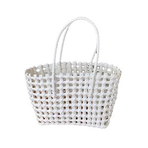 White handwoven cutout hollow straw bag for women, perfect for summer beach vacations