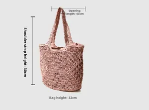 Pink woven straw tote bag dimensions showing 43cm width and 32cm height for beach use