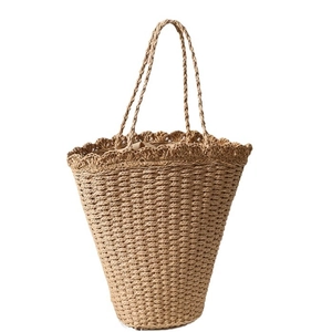 Japanese style fan-shaped woven straw handbag with scalloped trim for beach vacation