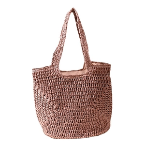 Handmade woven tote bag in dusty rose pink with honeycomb texture for summer beach