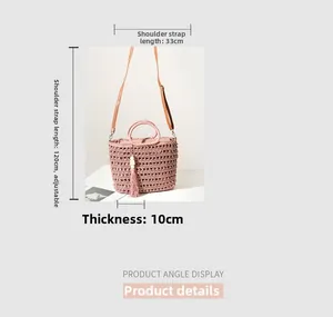 Pink crochet beach bag detail with measurements of thickness and strap length