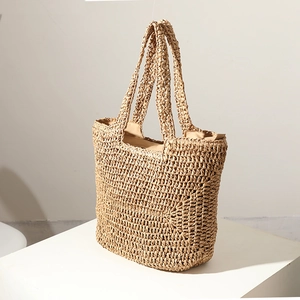 Minimalist large capacity woven straw tote bag for summer beach vacation with dual handles