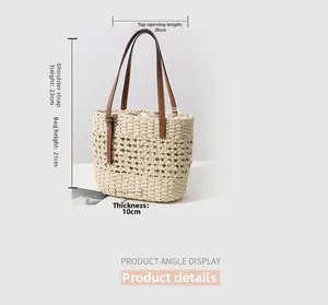 Detail of hollow woven tote bag with brown faux leather straps and dimensions marked