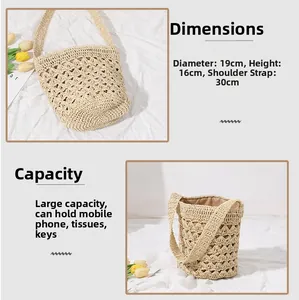 Detail of straw bucket bag dimensions 19x16cm with woven texture and long strap