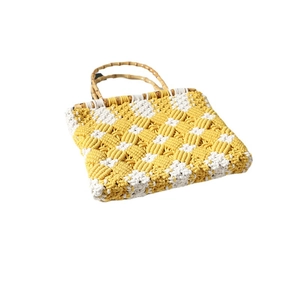 Handmade checkered cotton woven bag with round bamboo handles for summer beach vacations