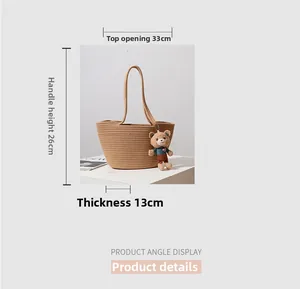 Detailed size guide of the straw tote bag showing 33cm width and 26cm handle height