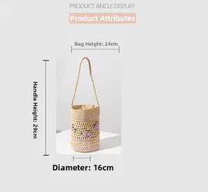 Detailed size specifications for raffia bucket bag with purple floral embroidery