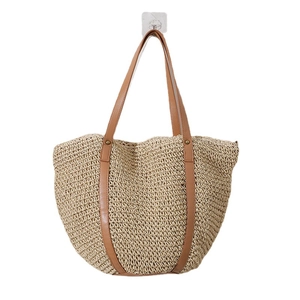 Large woven straw beach tote bag with brown leather straps for summer vacations
