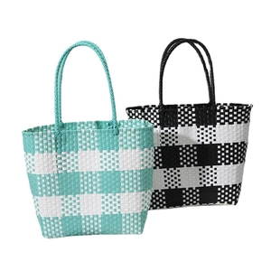 Fashionable large woven tote bags in green and black plaid for beach and travel