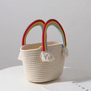 Handmade cream cotton woven bag with rainbow handles and tassels for beach vacations