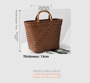 Detail view of large woven tote bag with carbonized bamboo handles and texture