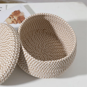 Minimalist round cotton rope storage basket with lid showing texture and interior detail