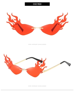 Detail of red flame-shaped sunglasses with golden metal frame and C02 black temple tips