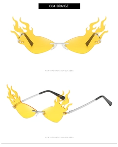 Detail view of flame-shaped sunglasses with orange lenses and silver metal frame S9052