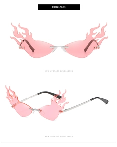Detail of pink flame lens sunglasses with silver metal frame and sleek black temples