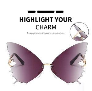 Detailansicht der Schmetterling Sonnenbrille mit lila Verlaufsgläsern und Goldbügeln