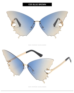 Detailansicht der schmetterlingsförmigen randlosen Sonnenbrille mit blau-braunem Farbverlauf