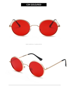 Detail of vintage round sunglasses with gold metal frame and red lenses from two angles