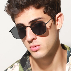 Close-up of vintage metal square sunglasses with black polarized lenses and sleek frames