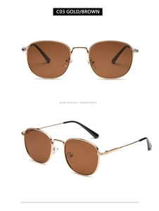 Detail view of gold metal sunglasses with brown lenses from front and side angles
