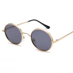 Retro round metal sunglasses with gold textured frames and dark grey lenses in 45-degree view