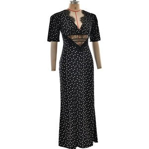 Detail of V-neck lace trim and waist lace hollow-out design on black polka dot dress