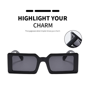 Detail view of stylish black rectangular sunglasses with UV protection and durable hinges