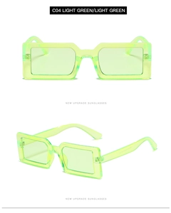 Detail view of stylish light green translucent rectangular sunglasses with wide temples