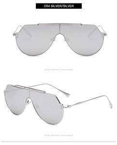 Vues frontale et latérale de lunettes aviateur argentées avec monture métallique industrielle