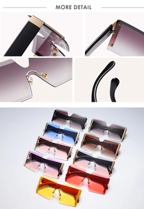 Detail view of reinforced metal hinges and integrated nose pads on oversized rimless sunglasses