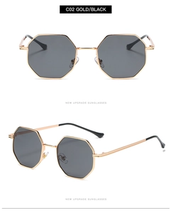 Detail view of octagon metal sunglasses in gold and black showing front and side angles
