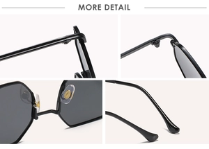 Detail view of reinforced hinges and nose pads on black octagonal sunglasses