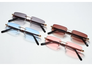 Close-up of frameless square sunglasses showing wood grain temples and CE certification marks