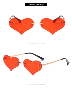 Detail showing red heart-shaped rimless lenses with intricate flame engraved patterns