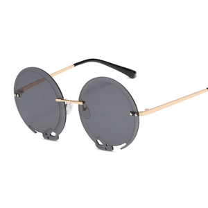 Runde Randlose Sonnenbrille Mit Metallrahmen PC Gläser Einzigartige Cutout Totenkopf Design UV400 Schutz Streetwear Brille