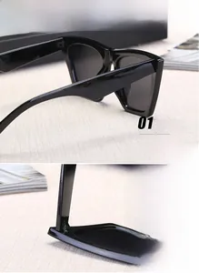 Gros plan des charnières métalliques renforcées et de la monture noire de lunettes